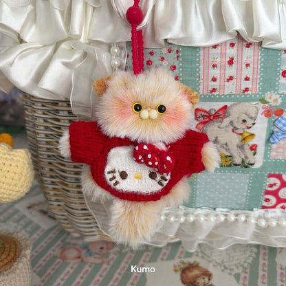 Pawsh Pendants: Handmade kitten in a red sweater with a bow, fluffy mini cat figurine, kawaii style, cute collectible decor.
