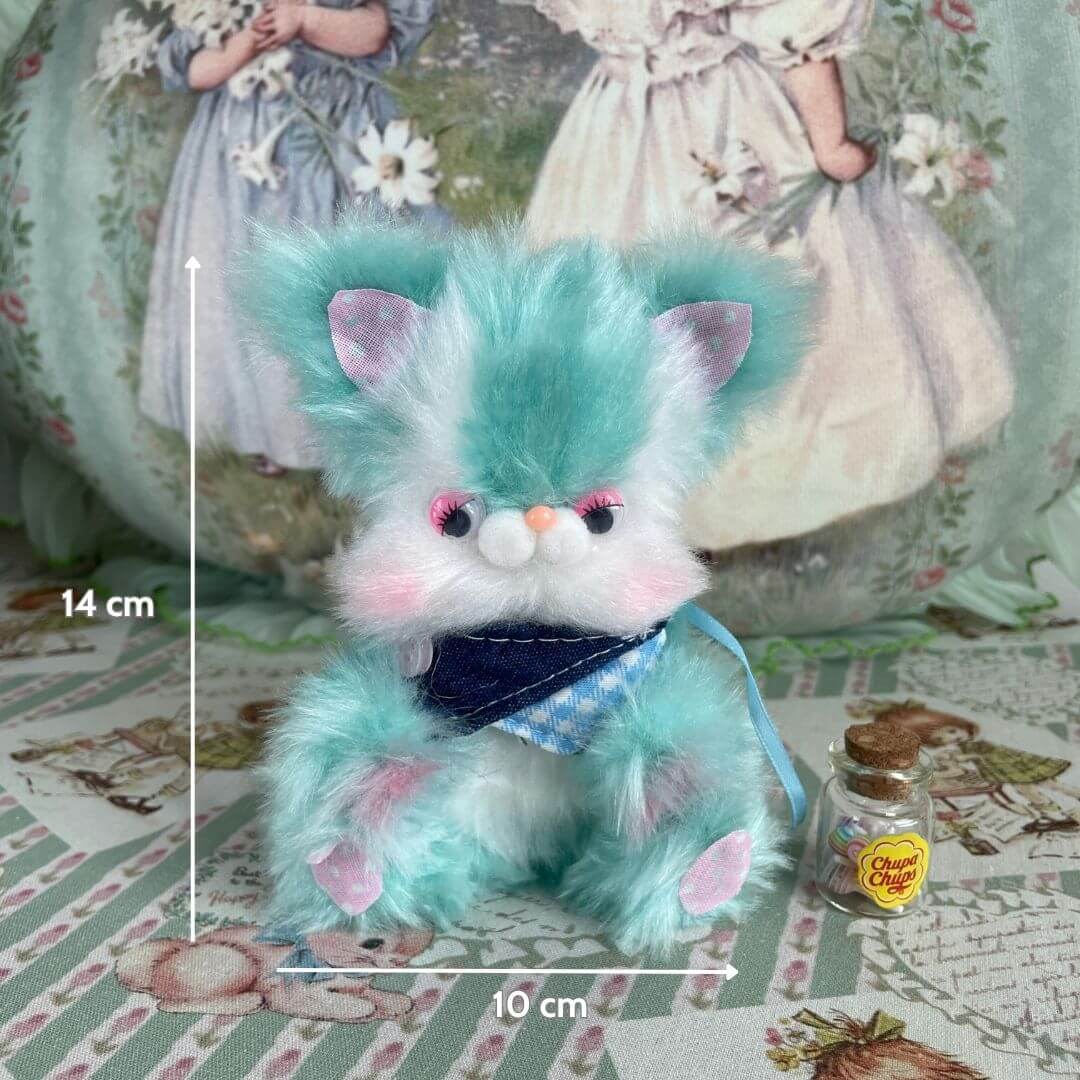 Cute turquoise Retro Bunny Companions figurine with fluffy ears and a blue scarf, inspired by vintage plush toys.
