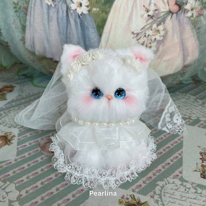 Handmade plush kitten toy from Enchanted Big Paws Collection, dressed in lace with a veil, perfect decoration or gift for cat lovers.