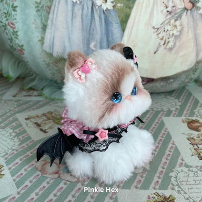 Handmade plush kitten toy from Enchanted Big Paws Collection with pink accessories, perfect for cat lovers and unique decor.
