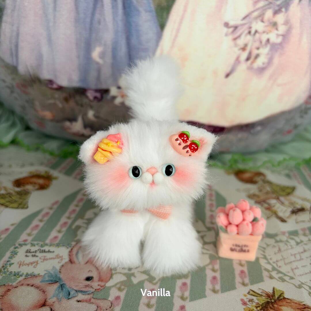 White Kitten Collection - cute fluffy kitten figurine with pastel accessories, styled with bows and candy, perfect for collectibles.