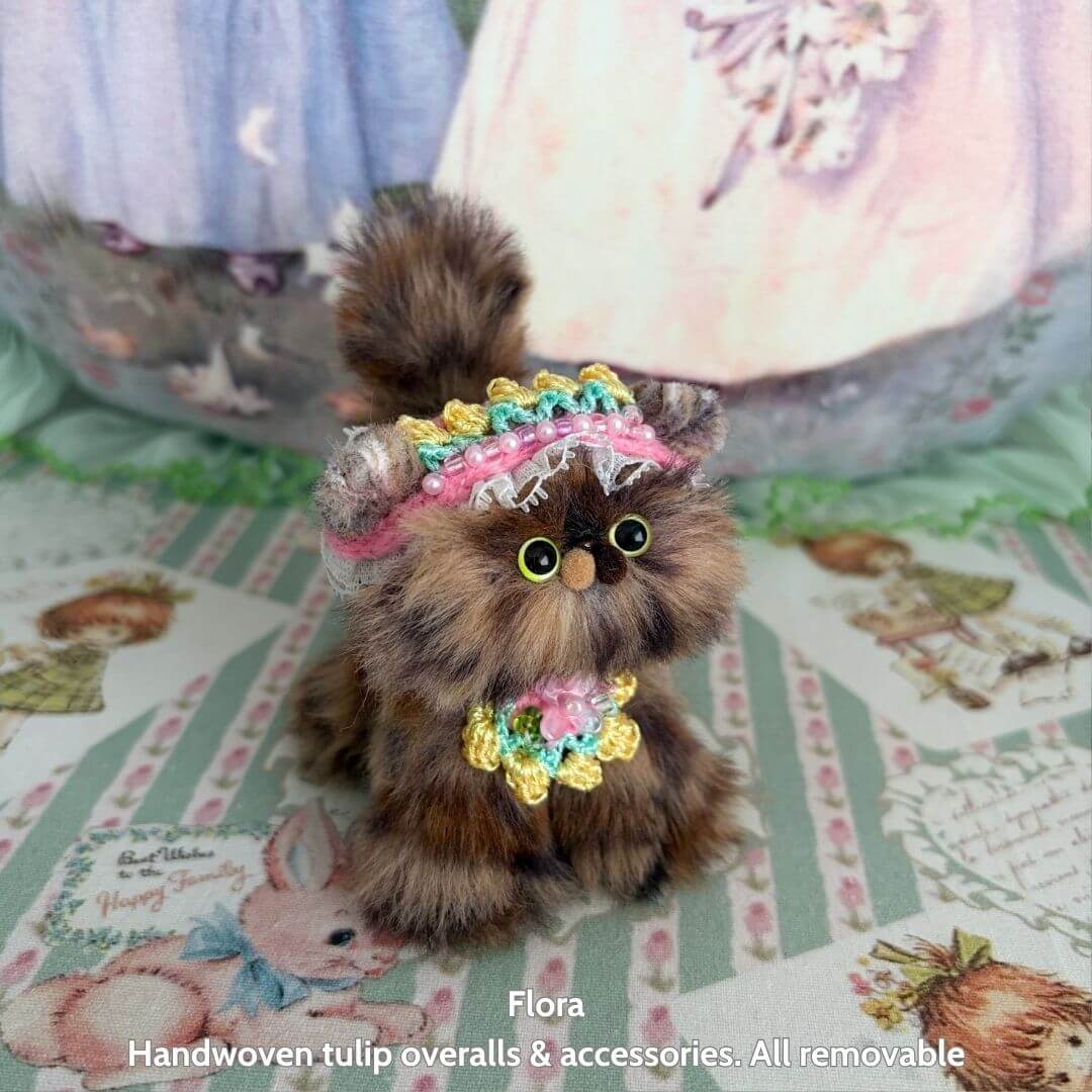 Spring Love Limited Collection features a fluffy handmade kitten in colorful tulip overalls, with a cute expression and removable accessories.
