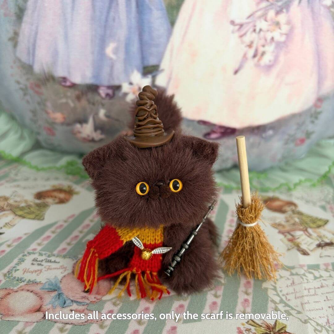 Magic Kitty Companions: fluffy brown kitten with a mini wizard hat, scarf, and broom, showcasing a kawaii style and fantasy theme.