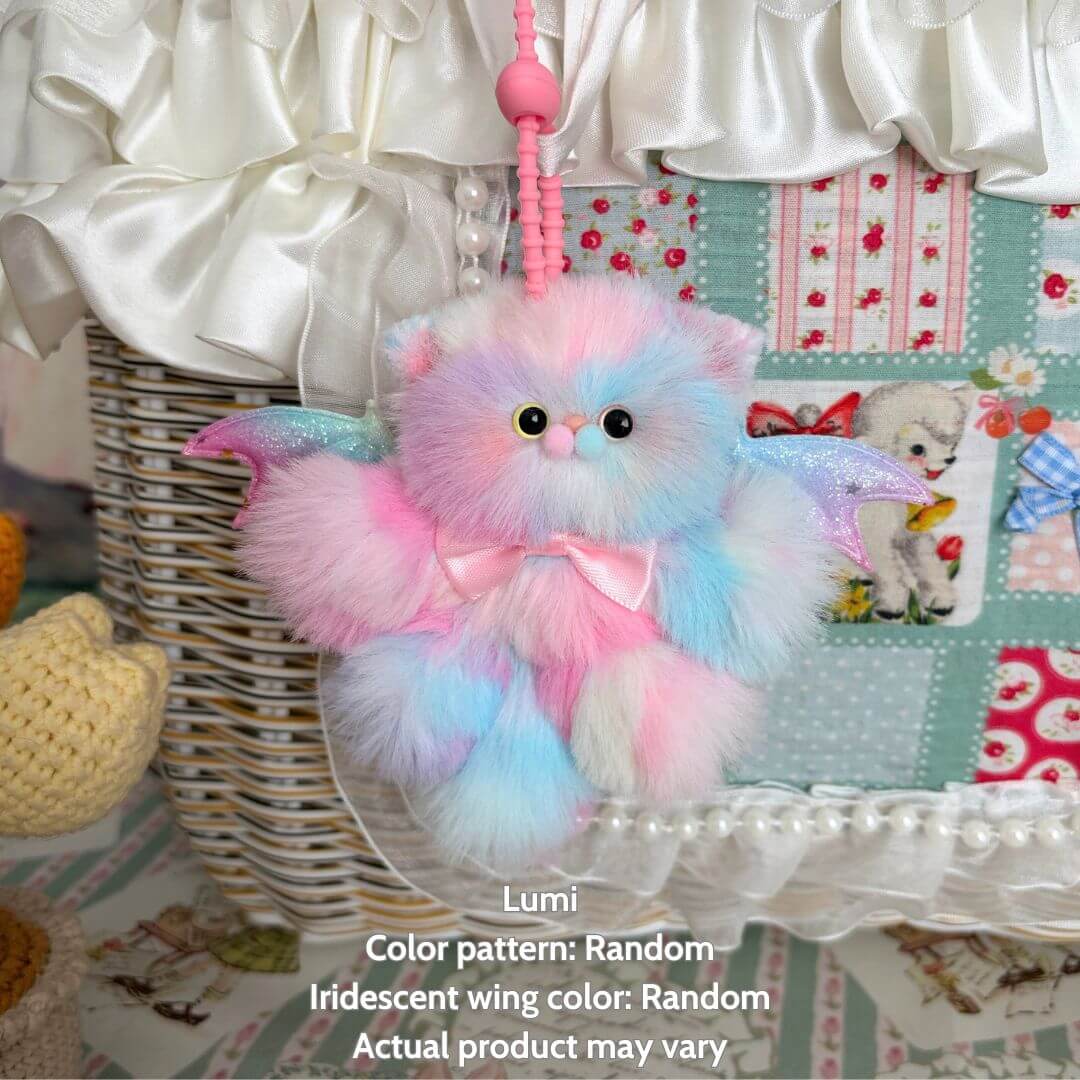 Winged Kitty Pendants in pastel colors with soft faux fur, tiny wings, and a cute bow, perfect as a fluffy cat collectible.