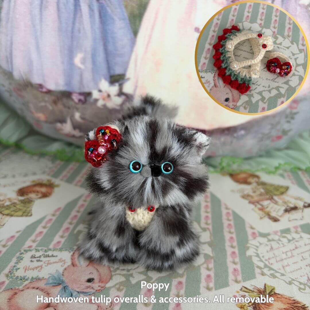 Handmade kitten from the Spring Love Limited Collection, fluffy black and gray with handmade accessories and cute tulip overalls.