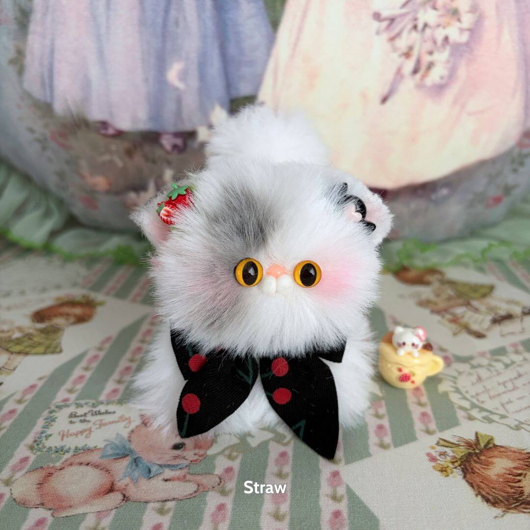 Fluffy Kitten Collection: Adorable fluffy cat figurine in grey and white with a bow, cute accessories, and kawaii charm.