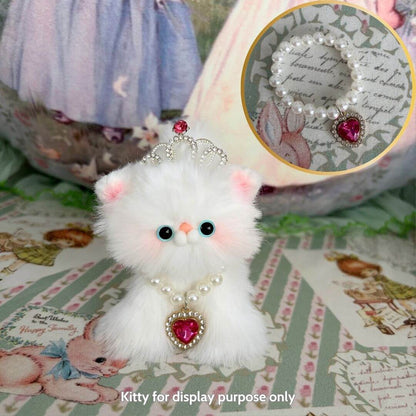 Elegant Heart Necklace on a fluffy kitten figurine, showcasing a pearl collar and pink heart pendant, perfect for miniature animal decor.