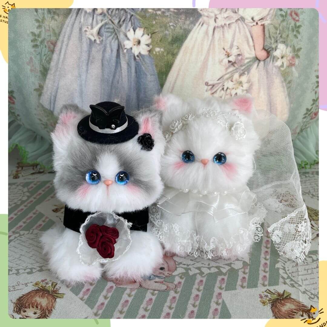 Enchanted Wedding of Mr. & Mrs. Paws featuring fluffy kittens in wedding attire, a tuxedo and bridal dress with lace details.