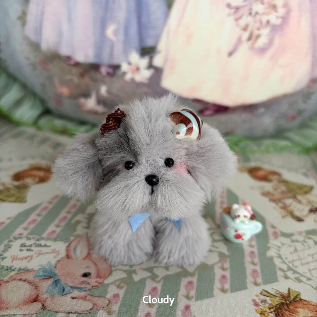 Adorable Puppy Collection featuring a fluffy grey puppy with a bow, cute expression, and playful pose, handmade miniature decor.