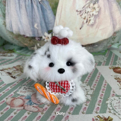 Cosplay Puppy Collection of a handmade puppy figurine with spotted fur, wearing a red bow and polka dot outfit, striking a cute pose.