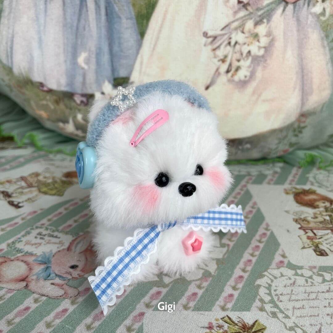 Adorable handmade puppy from the Cosplay Puppy Collection, featuring fluffy white fur, blue accessories, and a cute style.