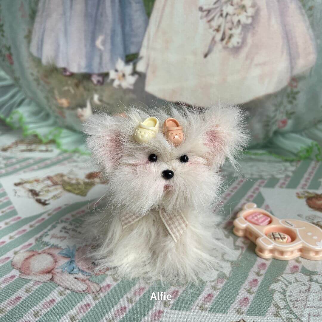 Fluffy Puppy Collection handmade white toy dog figurine with colorful bows, cute pose, and whimsical decor.