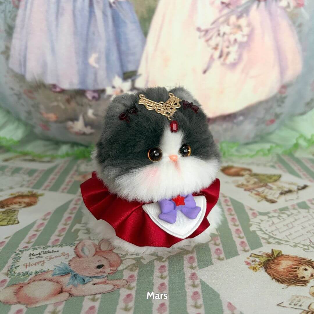 Moonbound Companions handmade kitten with a crown and red collar, fluffy grey and white kawaii cat figurine.