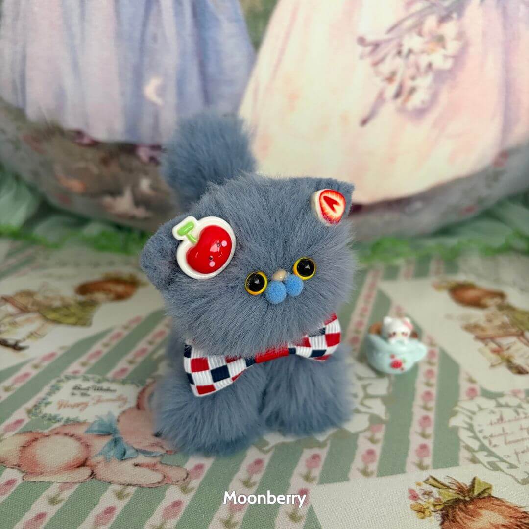 Fruity Kitten Collection: cute blue fluffy kitten figurine with cherry accessories and bow tie, handcrafted in UK, adorable kawaii style.