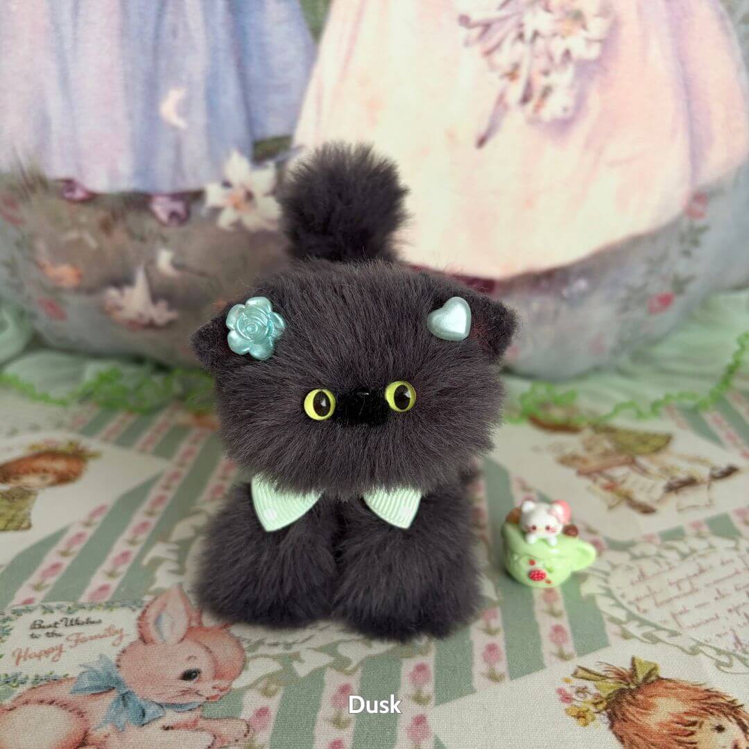 cute black fluffy kitten figurine with mint bow and accessories from the Grey Kitten Collection, handmade in the UK