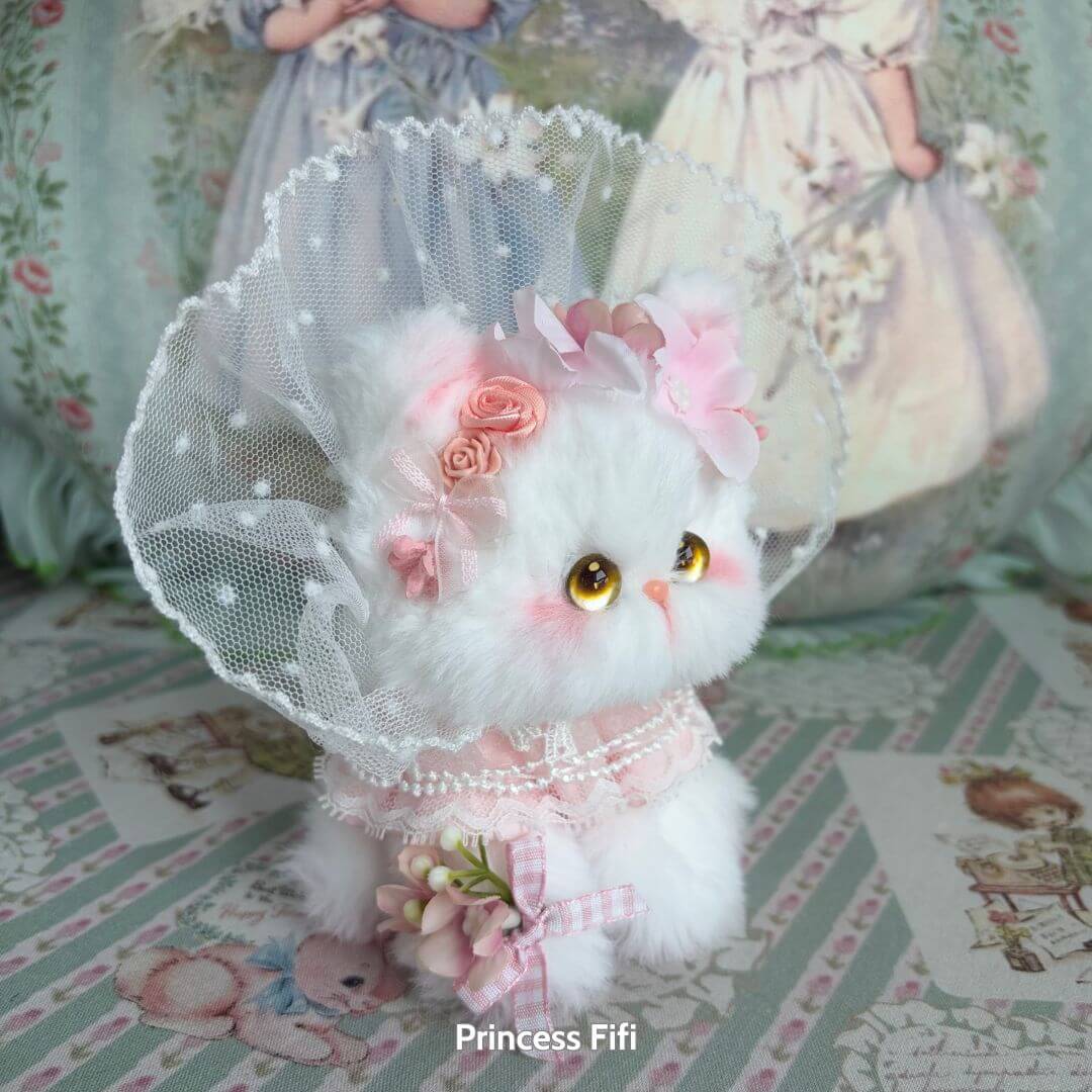 Enchanted Big Paws Collection: cute fluffy kitten figurine in bridal attire with flowers and lace, handmade in UK.