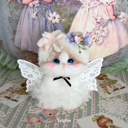 Enchanted Big Paws Collection fluffy kitten figurine with wings, floral accents, in cute kawaii style, handcrafted in UK.