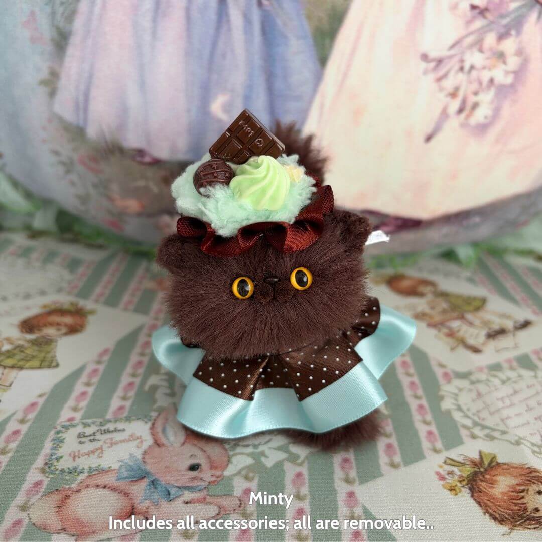 Sweet Treat Kitties handmade kitten with chocolate and mint dessert toppings, fluffy brown fur, and a cute bow, collectible cat figurine.