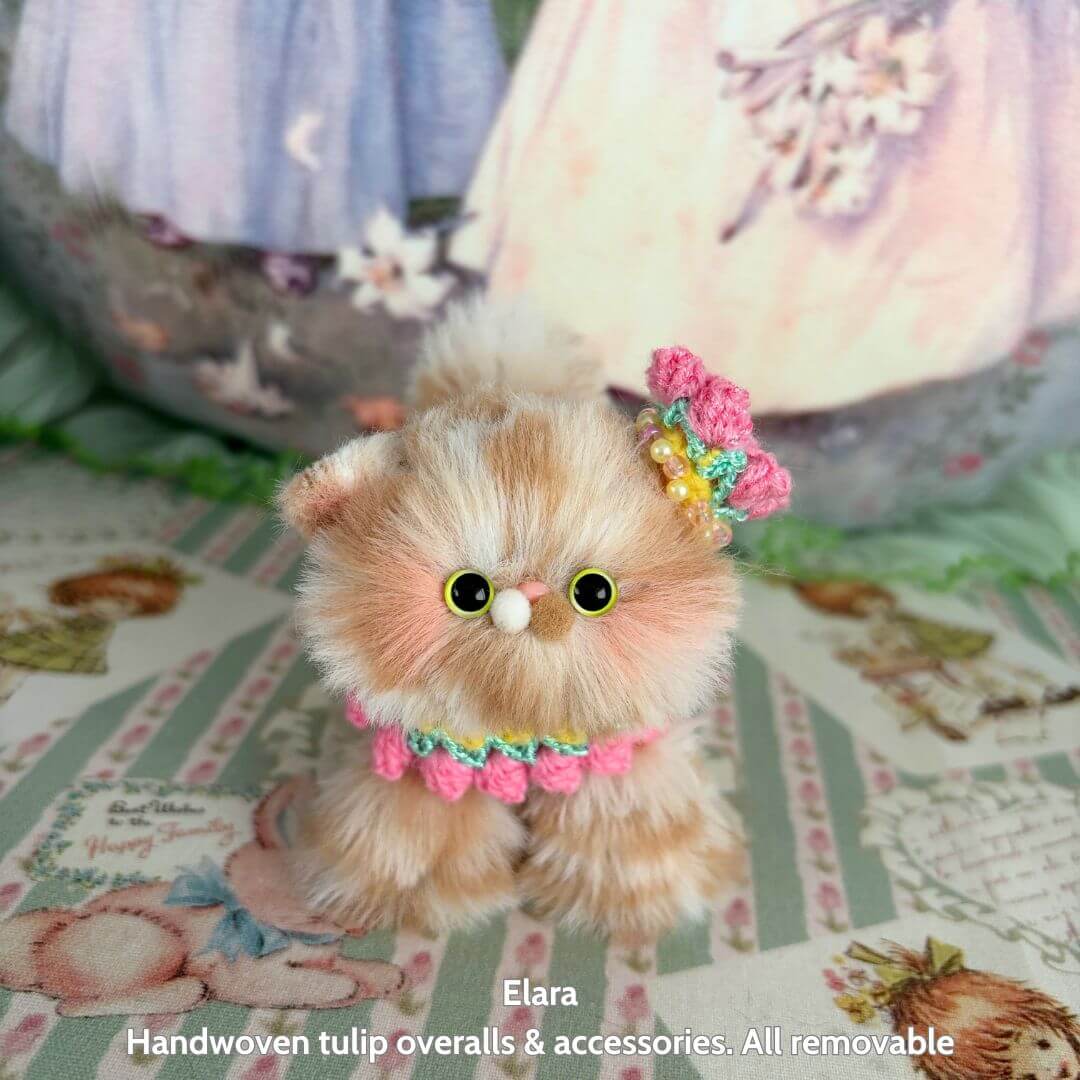 Spring Love Limited Collection handmade kitten figurine in pastel colors, wearing pink and green floral accessories, cute collectible decor.