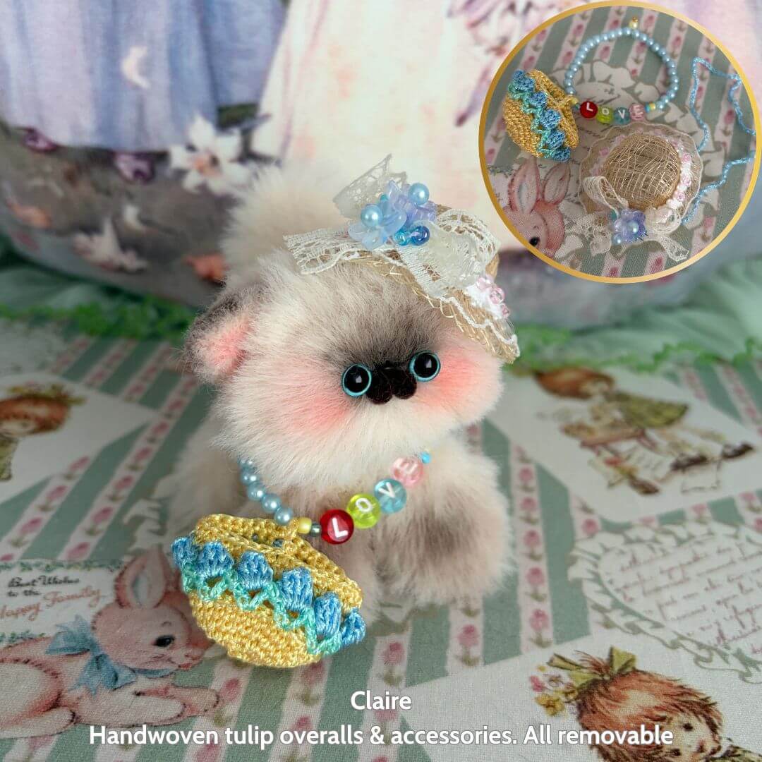 Spring Love Limited Collection handmade kitten in tulip overalls with removable accessories, soft colors, and cute details.