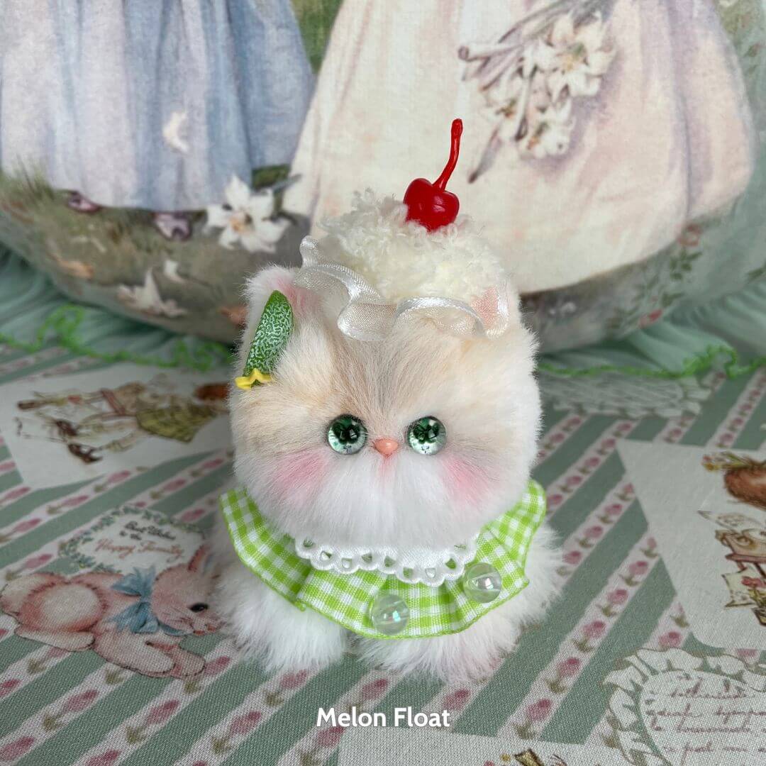 Mewlicious Collection - kawaii handmade kitten in a dessert-themed outfit with cherry on top, fluffy cat figurine, cute cat collectible.