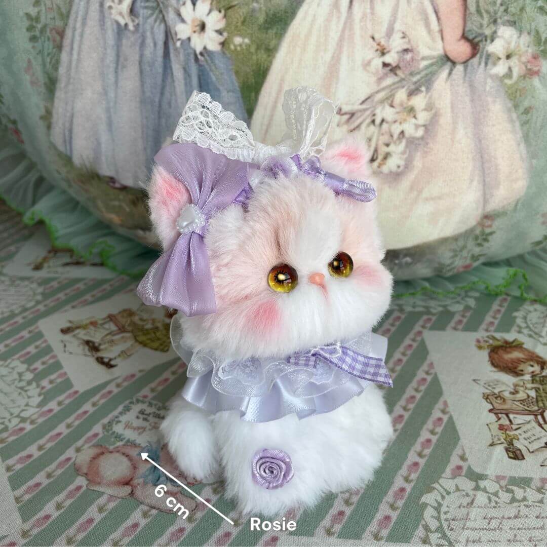 Adorable fluffy kitten figurine from Enchanted Big Paws Collection, featuring pink and lavender colors, cute kitty accessories, handmade in UK.