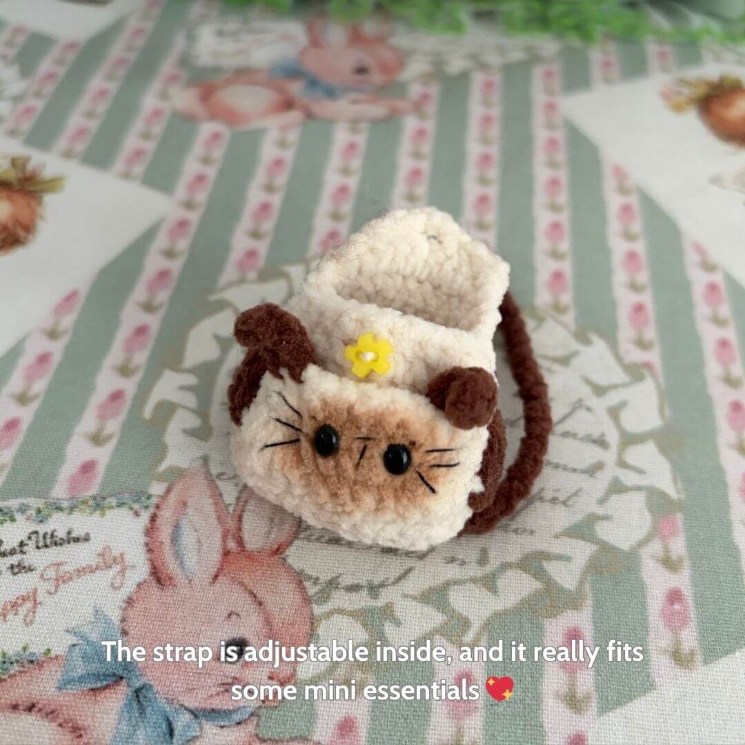 Handmade Mini Backpack styled as a kawaii cat with adjustable strap, featuring brown and cream colors, perfect for a miniature kitten.
