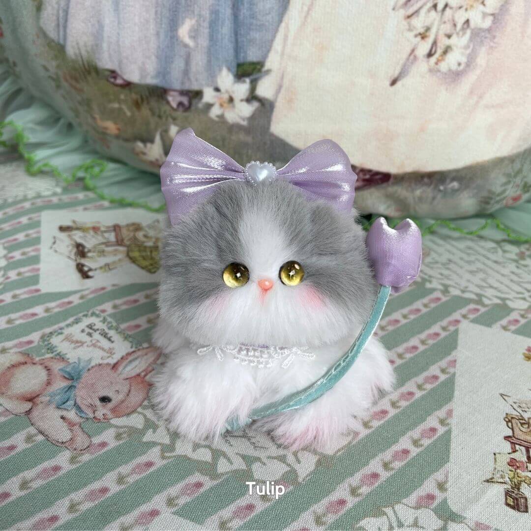 Blossom Kitten Collection: Cute fluffy grey and white handmade kitten with a lavender bow and a tulip, designed in the UK.