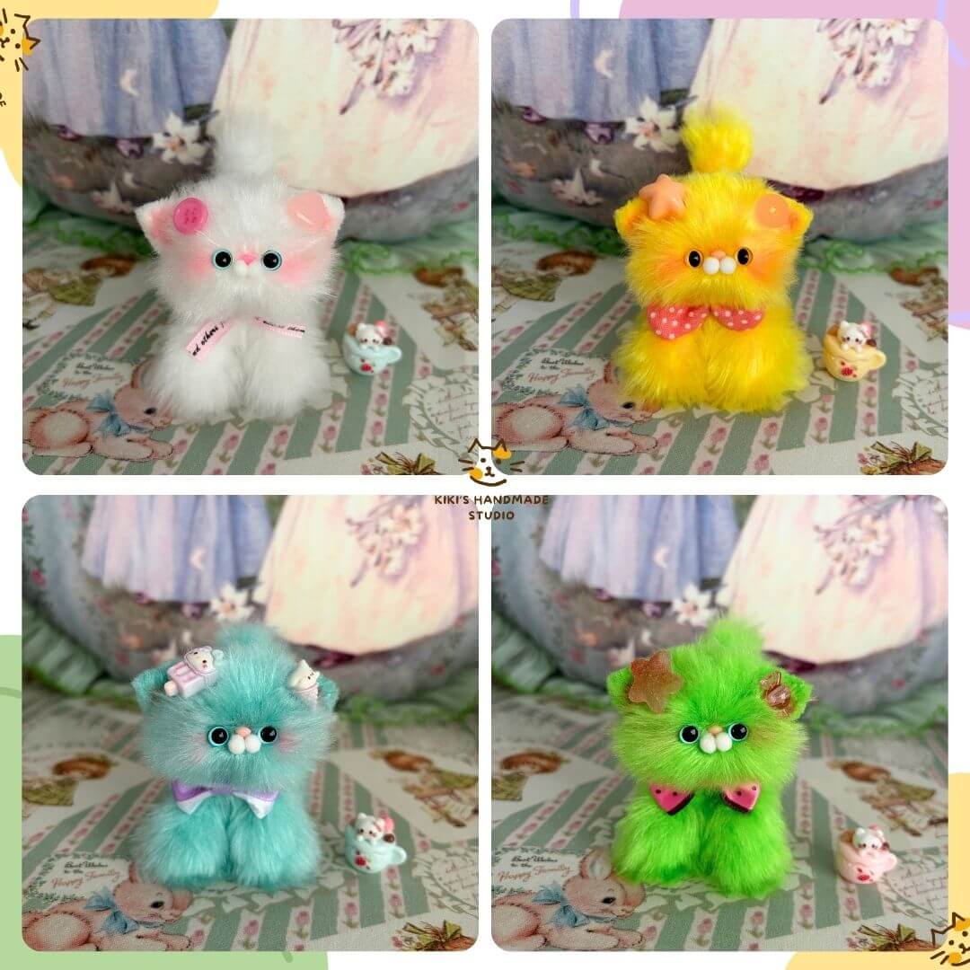 Glossy Meowgic Collection featuring colorful handmade kittens: fluffy white, yellow, blue, and green kawaii cats with playful accessories.