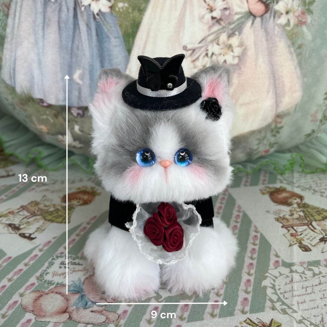 Adorable miniature kitten in tuxedo with roses, top hat, fluffy gray and white fur, theme: Enchanted Wedding of Mr. & Mrs. Paws.