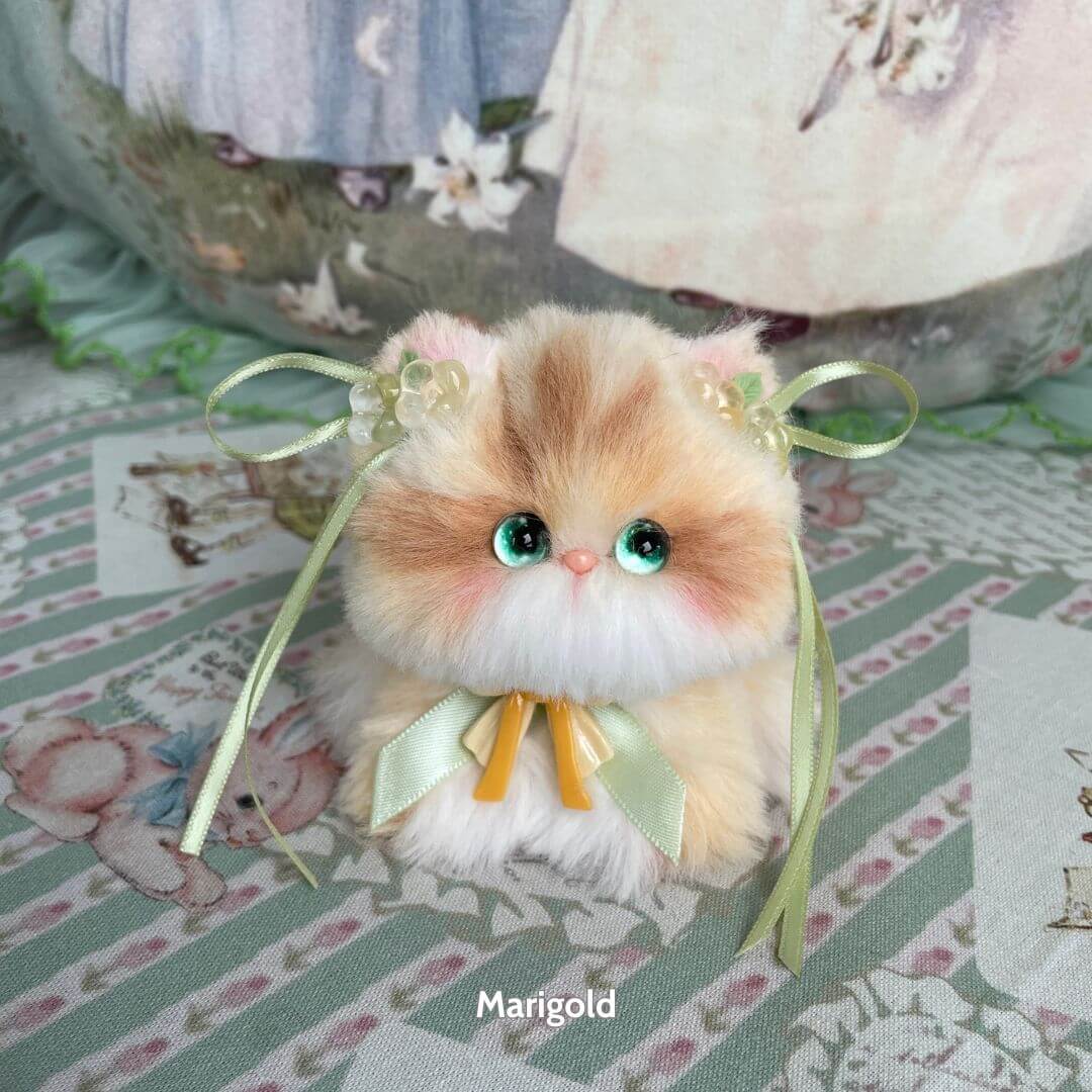 Alt Tag: Blossom Kitten Collection miniature kitten with fluffy fur, green eyes, pastel ribbons, and floral accents, handmade in UK.