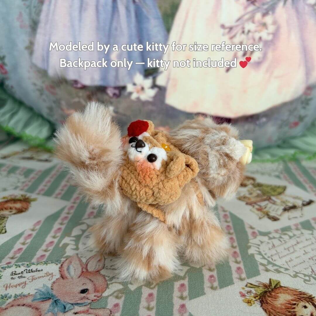 Handmade Mini Backpack styled on a fluffy cat figurine, showcasing charming details and soft textures in a whimsical setting.