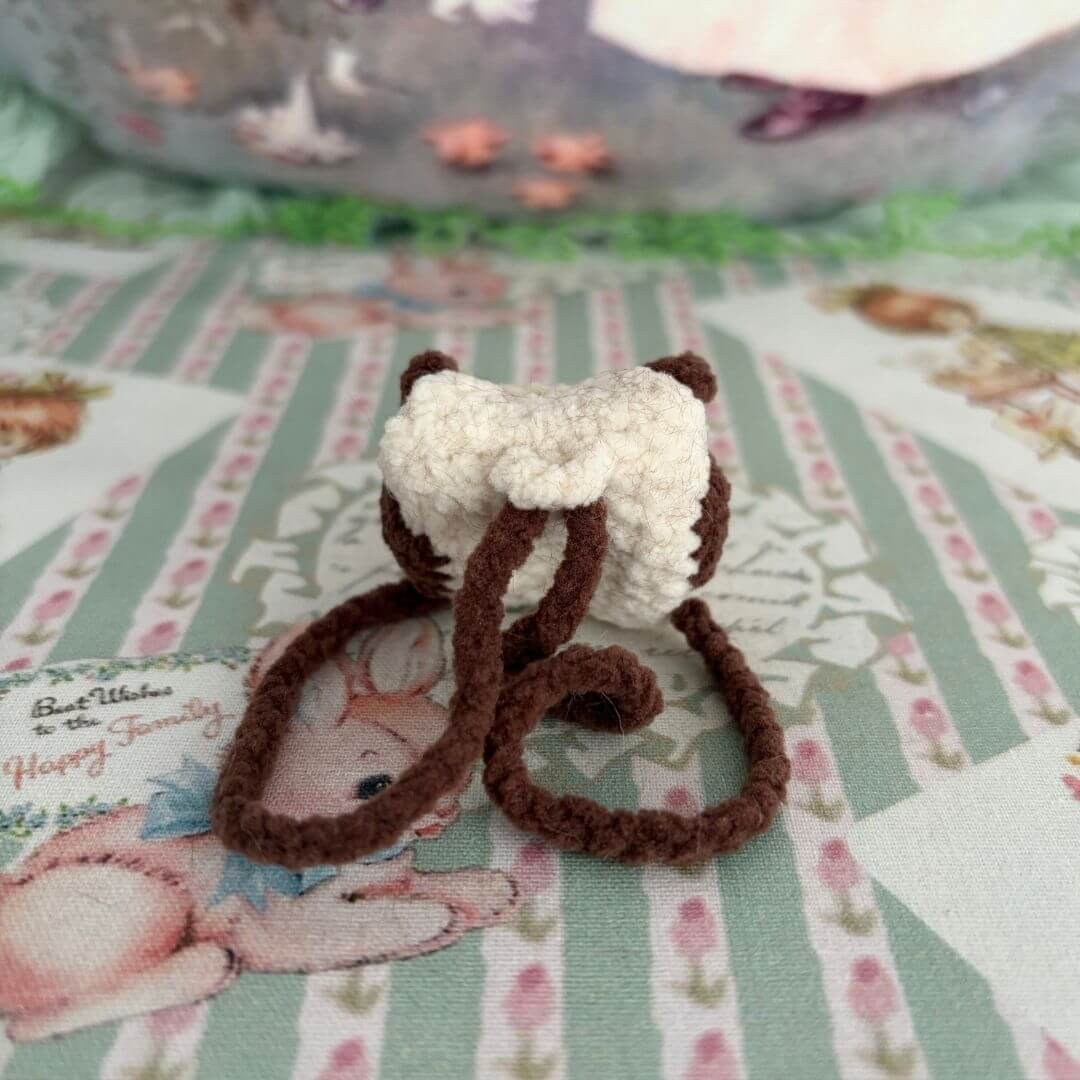 Handmade Mini Backpack in kawaii style, featuring a fluffy kitten design with brown and cream colors, perfect for miniature cat decor.