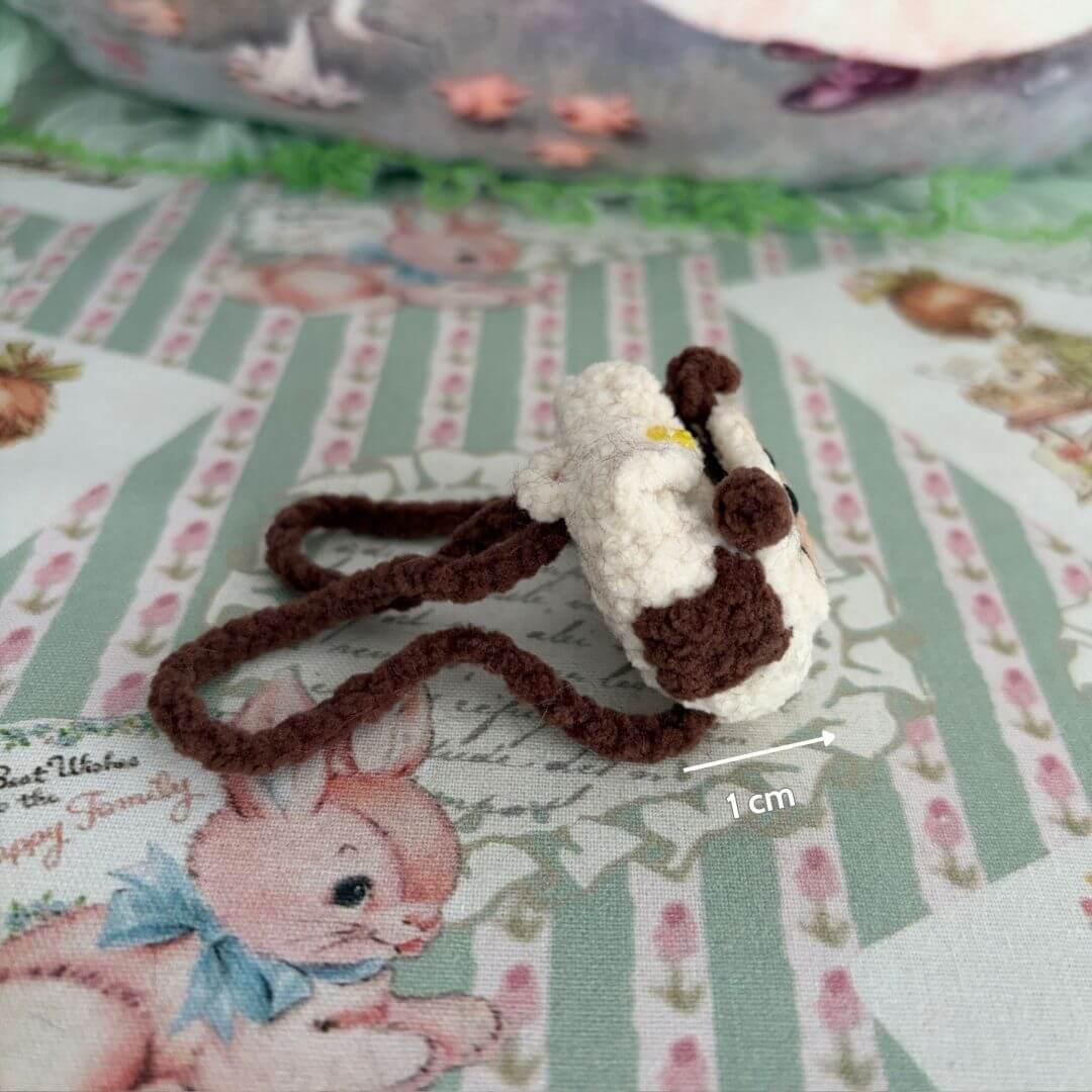 Handmade Mini Backpack for a miniature kitten, featuring soft textures and charming details, crafted for cute animal collectibles.