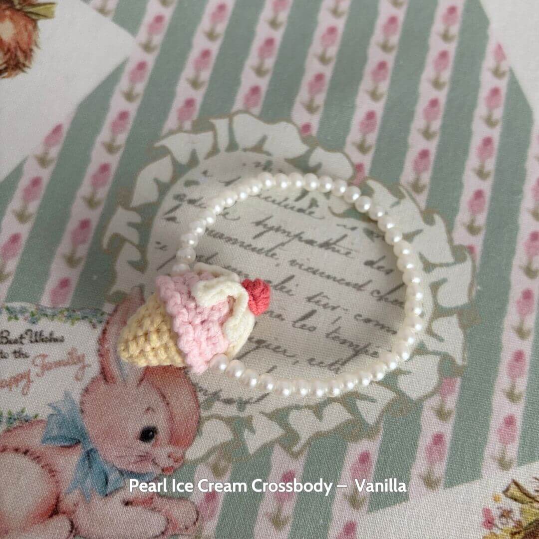 Cute Pearl Ice Cream Crossbody bag featuring a vanilla ice cream cone, perfect accessory for Snuggle Bits handmade kitten.