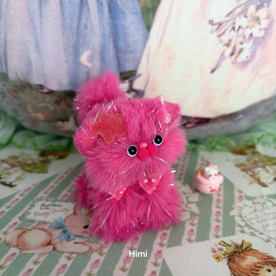 Handmade kitten from the Twinkling Kitten Collection, pink fluffy cat figurine with star accessory, cute animal collectible.