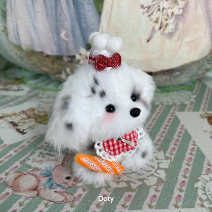 Handmade puppy from the Cosplay Puppy Collection, dressed as a chef with a hat, apron, and baguette, showcasing a playful kawaii style.