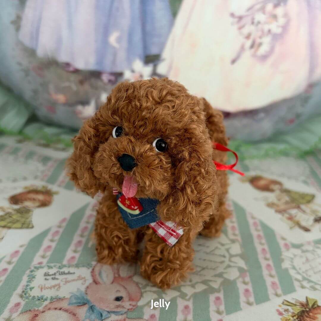 Lifelike Puppy Collection features a fluffy brown puppy figurine with expressive eyes and a cute blue collar, perfect for dog lovers.