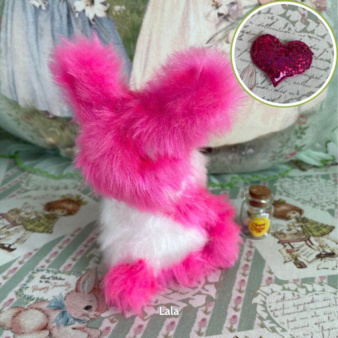 Cute Retro Bunny Companions in pink and white, featuring fluffy fur and a sparkly heart accessory, adding charm to any decor.