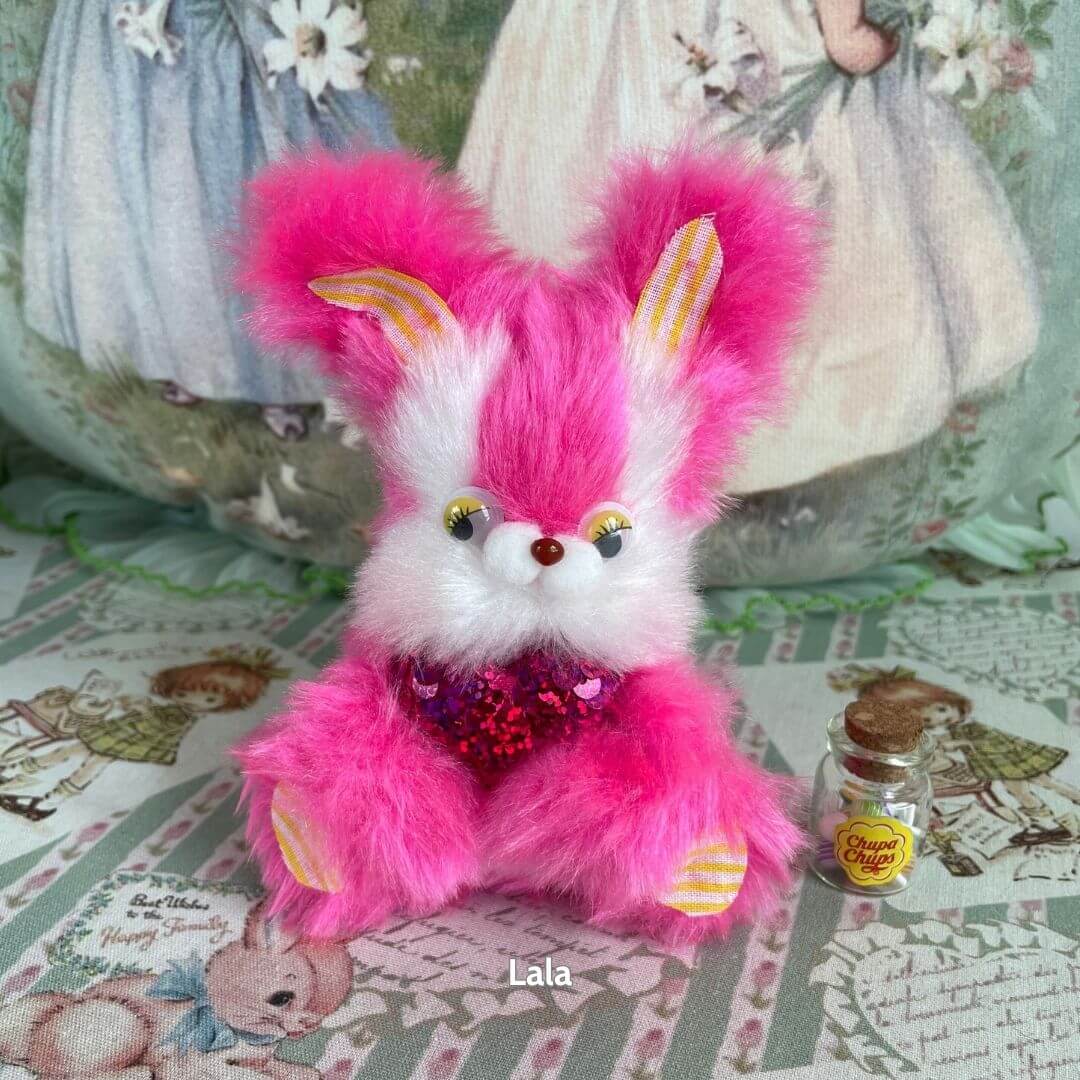 Retro Bunny Companions, pink fluffy bunny with oversized ears, heart-shaped decoration, vintage style, cute collectible decor.