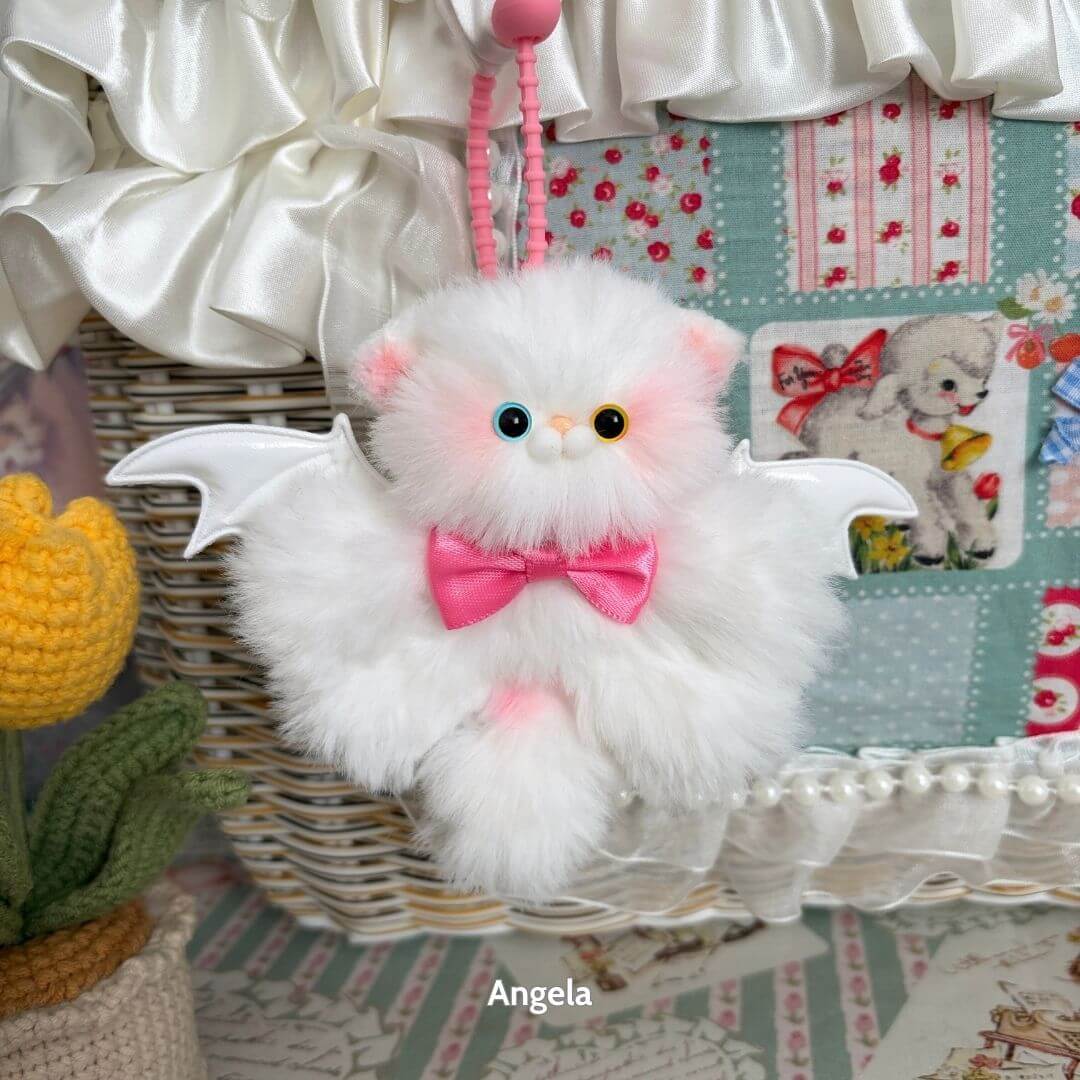 Winged Kitty Pendants featuring a fluffy white kitten with pastel pink accents, tiny wings, and a pink bow, perfect for cute animal collectibles.