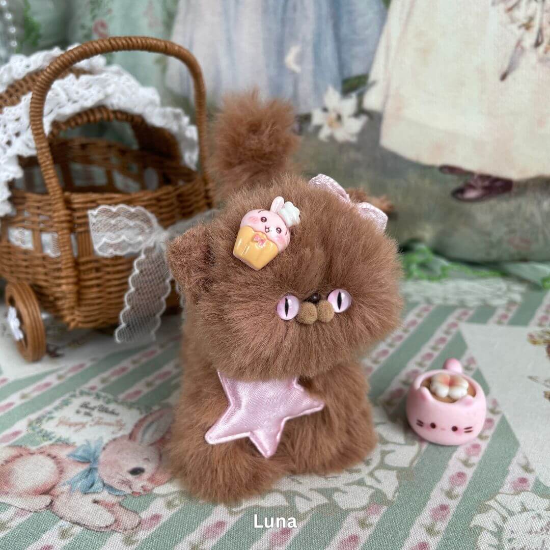 Handmade brown kitten plush with cupcake accessory, part of the Brown Kitten Collection, showcasing soft faux fur and cute expression.