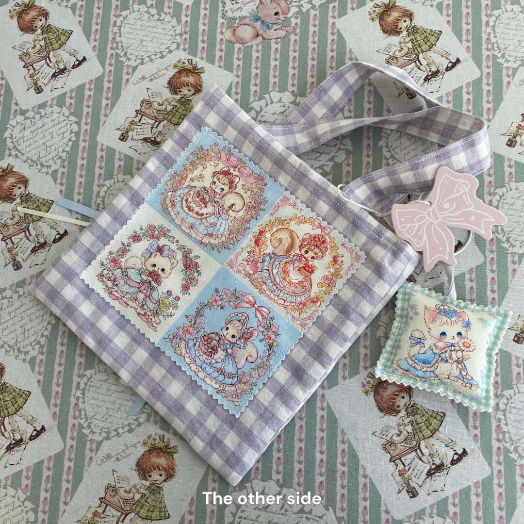 Handmade 20cm x 20cm Dreamy Tote Bag with double-sided cat and squirrel design, showcasing whimsical fairy-tale style.