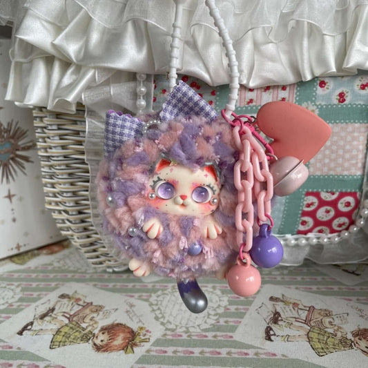 Handmade Fluffy Kitten Ball Bag Pendant with pastel colors, fluffy texture, and cute details. Limited edition cat-themed accessory.