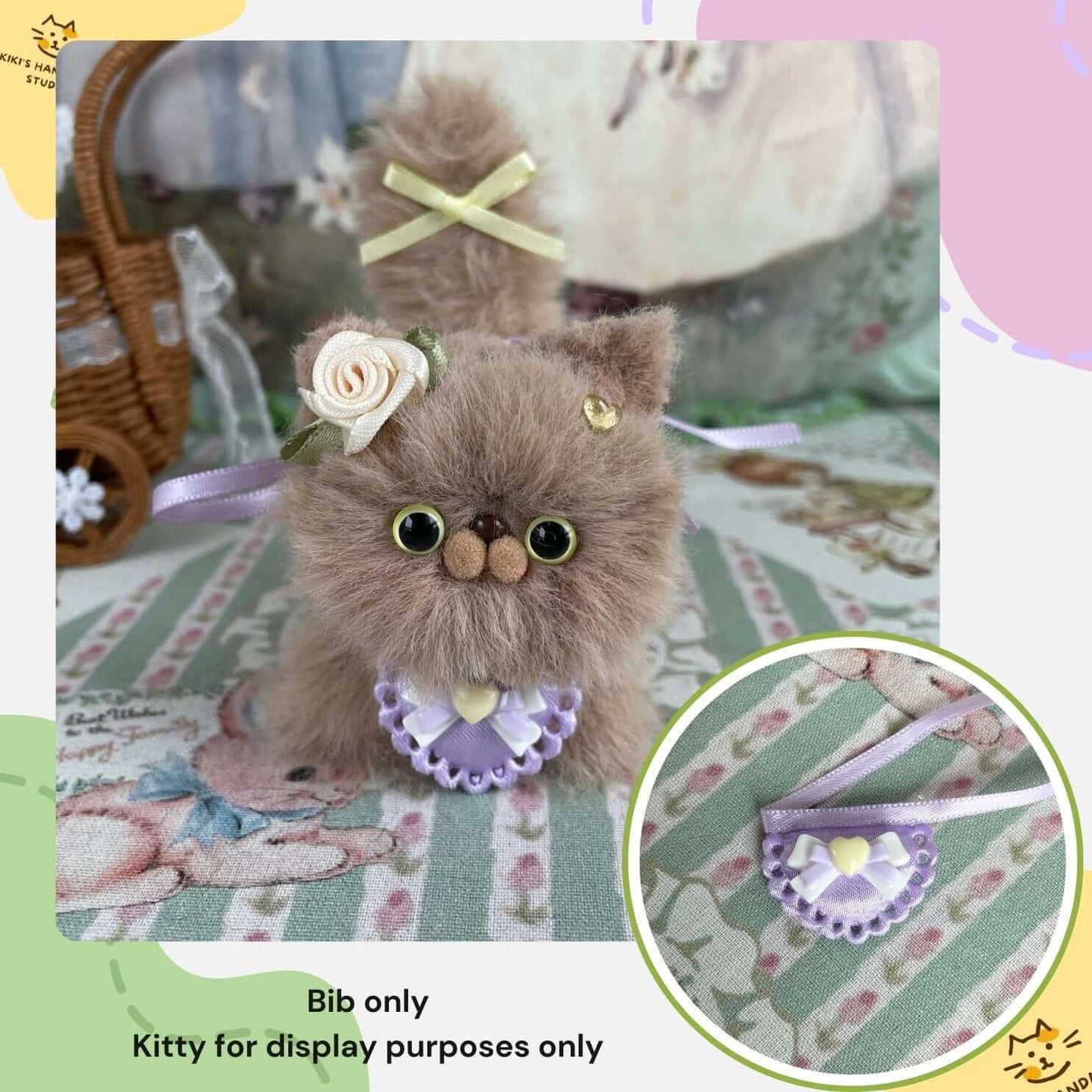 Handmade mini bib on plush kitten with decorative violet bow collar, ideal for pet accessories display; kitten toy for visual purposes only.