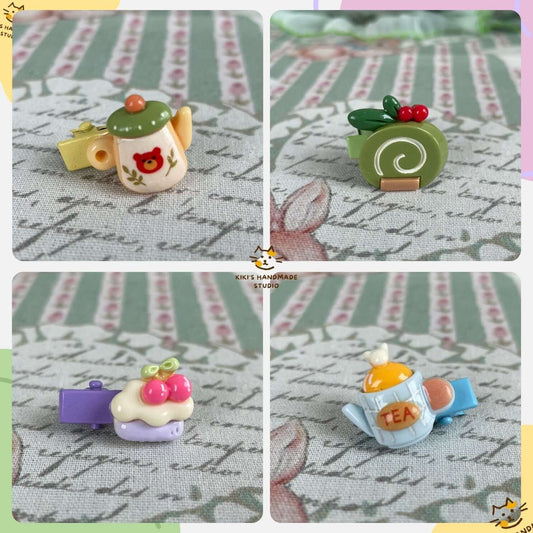 Handmade mini clips featuring designs of teapots, cakes, and festive treats; perfect for decorating plush toys or accessorizing bags.