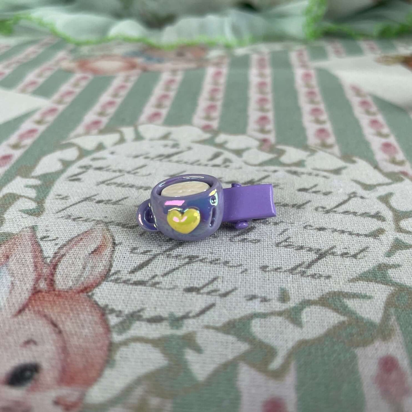 Purple handmade mini clip with a heart design, perfect for decorating and accessorizing plush toys or personal belongings.