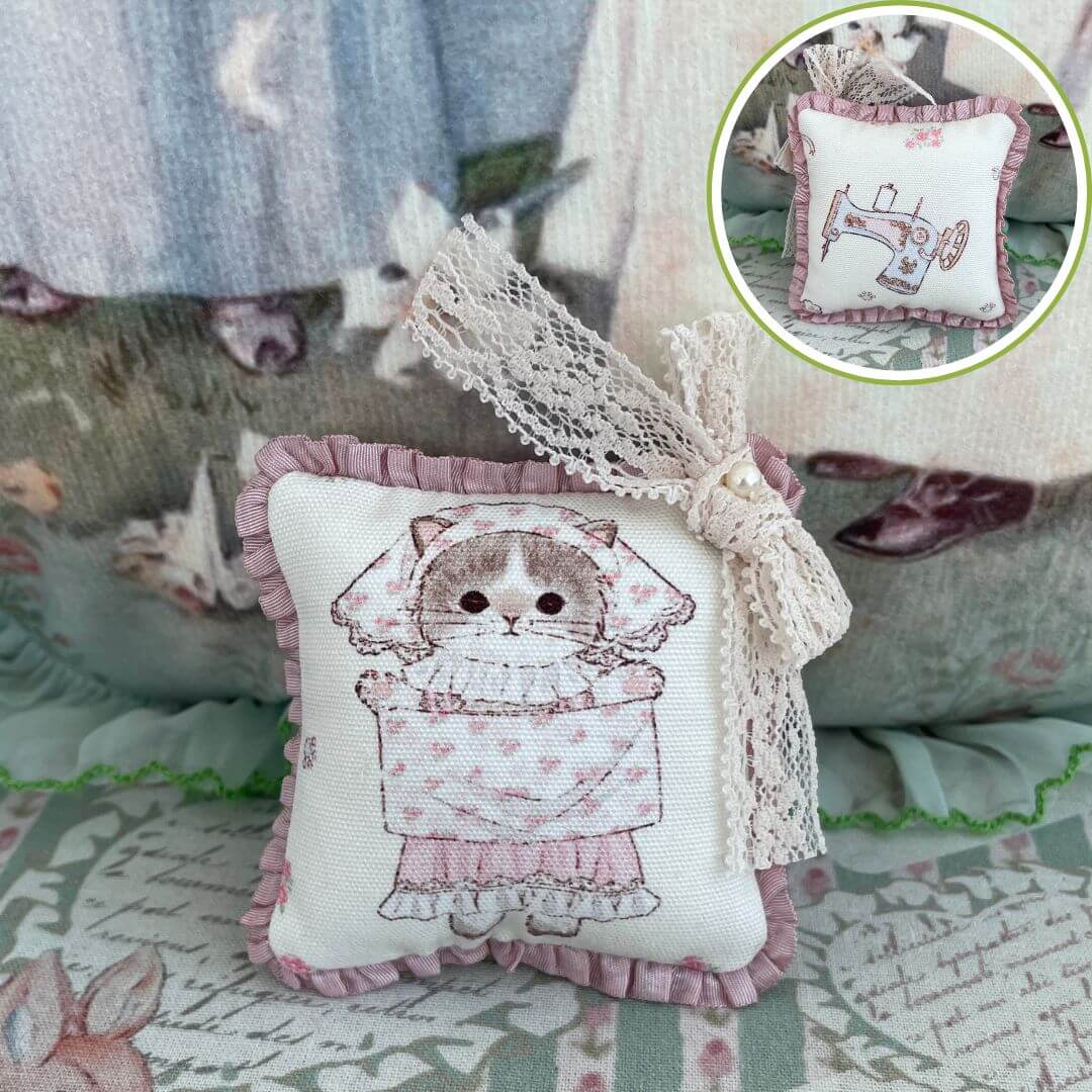 Handmade Mini Cuddle Critter Cushion with kitten design, lace bow, and pink ruffled edges, ideal as plush toy or desk decoration.