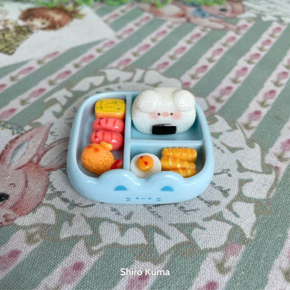 Mini Cat Bento Box with fluffy kitten onigiri, colorful sushi, and miniature food in a cute blue tray.
