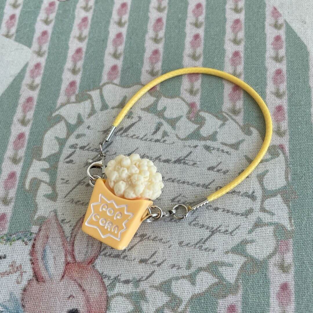Mini popcorn crossbody bag for handmade plush kittens and puppies, cute accessory or decoration, intricate design.